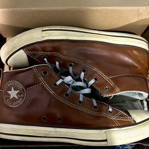 Used brown converse .